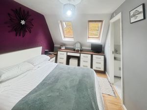 Bedroom One- click for photo gallery